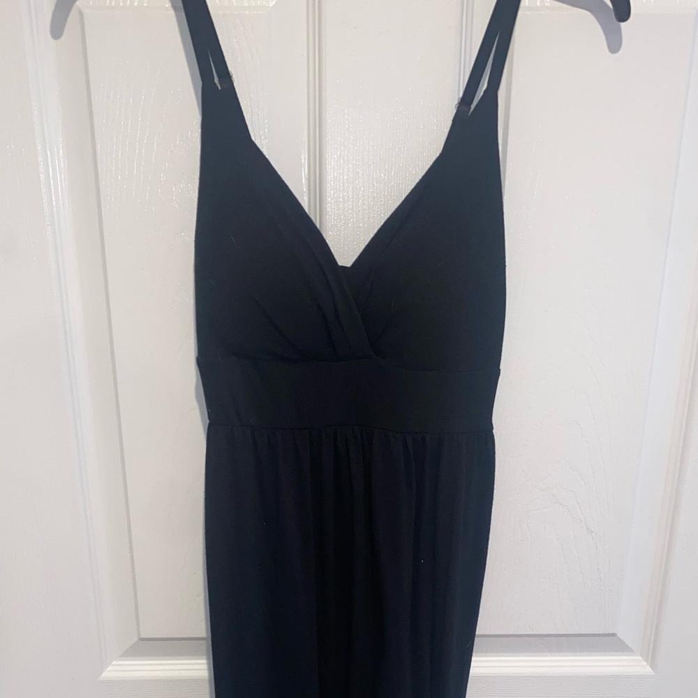 Long black maxi dress with tie back. Fitted dress, long to the floor